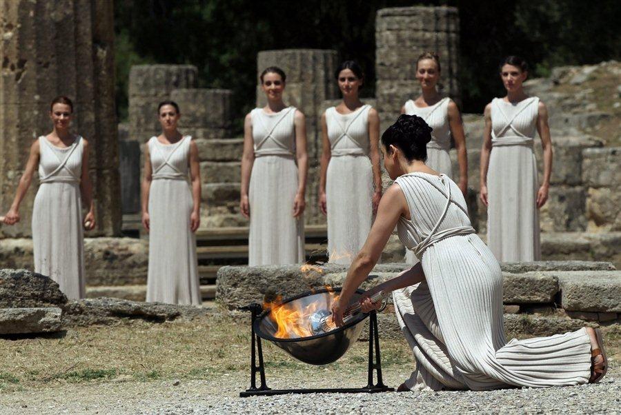 LONDON OLYMPIC FLAME LIT IN OLYMPIA