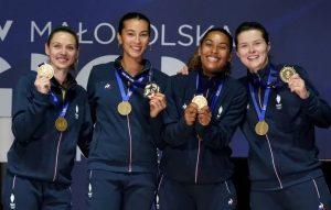 France's Manon Apithy-Brunet, Sara Balzer, Margaux Rifkiss and Cecilia Berder celebrate after winning gold against Team Italy during the Women's Sabre Team gold medal match during the Fencing competition at the European Games 2023 in Krakow, Poland, on June 30, 2023. Photo by JANEK SKARZYNSKI / AFP